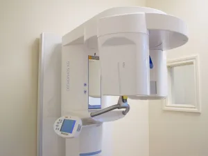 an image of Sirona Orthophos XG machine in a white room